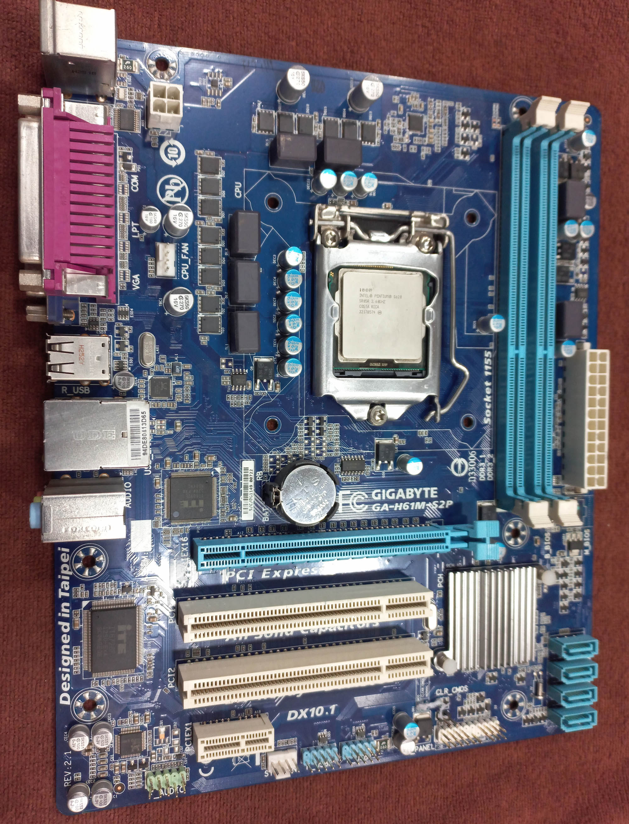 مادربرد گیگابایت مدل GA-H61M-S2P به همراه پردازنده Pentium G620، پشتیبانی از ویندوز، شبکه گیگابیت، صدای HD، گارانتی سلامت کالا