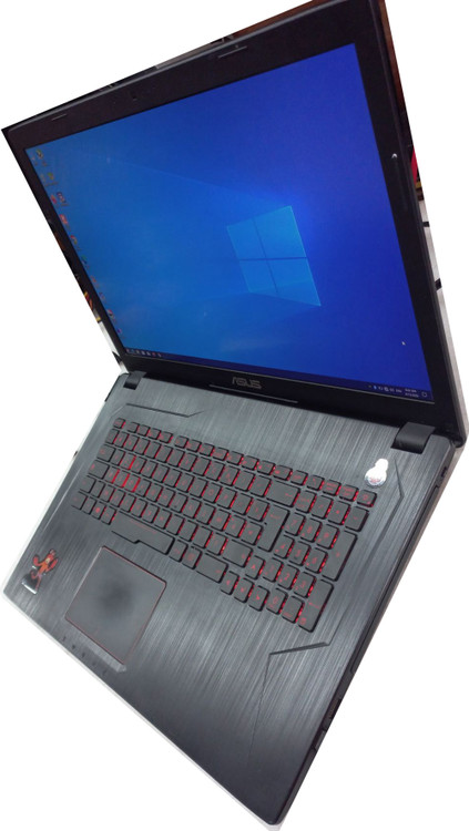 لپ تاپ گیمینگ ROG ایسوس مدل FX753، وزن 2.8 کیلوگرم، ابعاد 415x273x32 میلی متر، باتری 48 وات ساعت، سیستم خنک کاری هوشمند